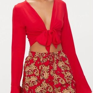 Red front tie long sleeve shirt